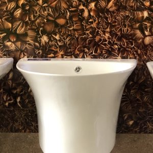 Round wall-hung ceramics basin